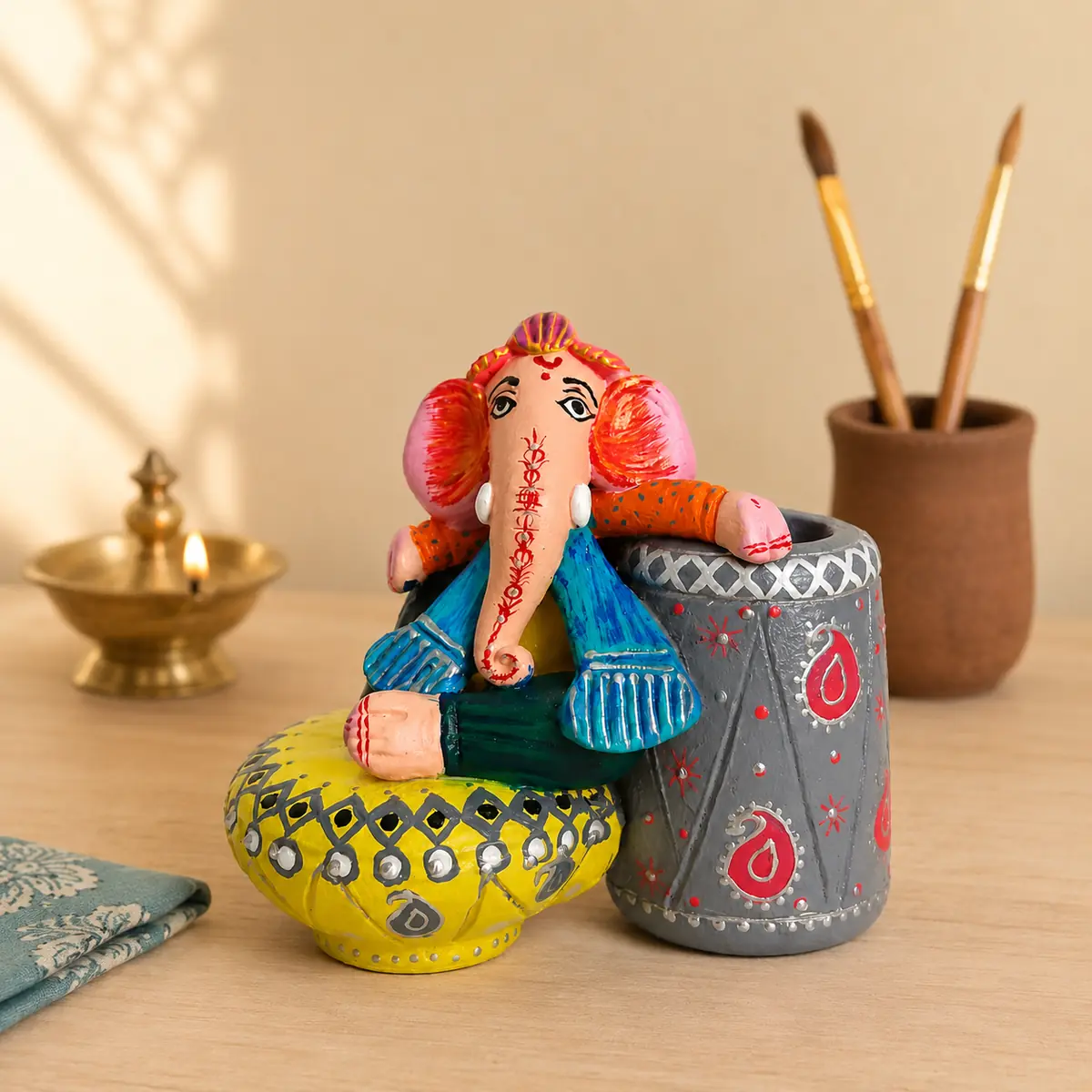 Colourful hand-painted Ganesha pen holder